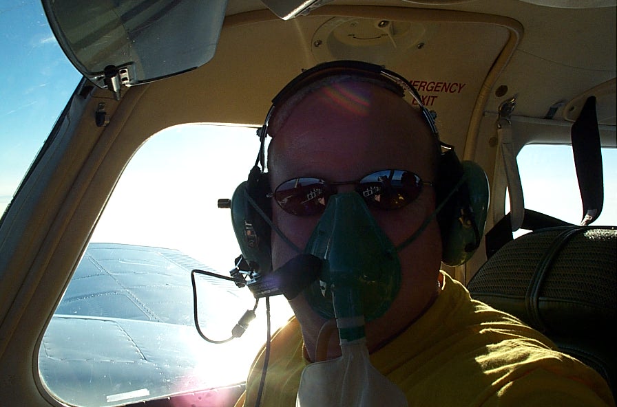 Chief Flying Instructor David Parry at altitude with oxygen mask.  Langley Flying School.